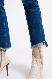High Waisted Jeans With Asymmetrical Hem