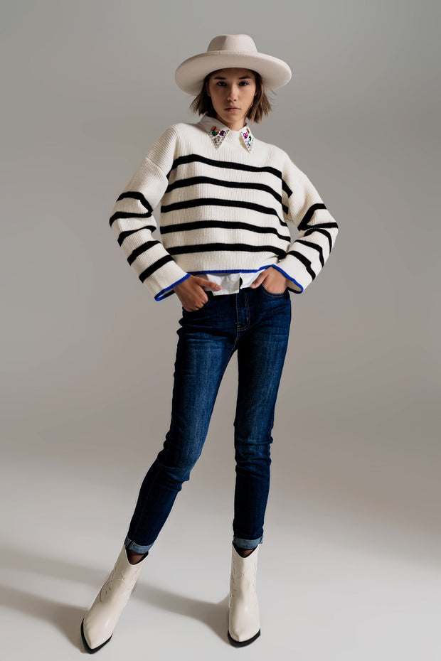 Black Striped Jumper With Blue Stripe Detail on the Bottom