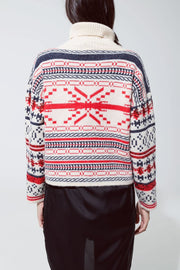 Chrstismas Sweater With Turtle Neck and Embroidered Sequin Details in Cream