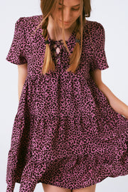 Short Sleeve Baby Doll Dress With Neck Detail in Purple Leopard Print