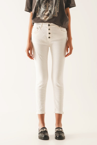 Exposed Buttons Skinny Jeans in Cream