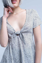 White Polka Dot Top With Ruffle Hem