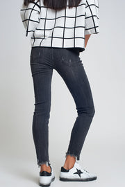 Mid Rise Jeans in Black With Raw Hem