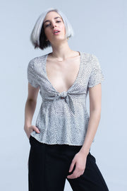 White Polka Dot Top With Ruffle Hem