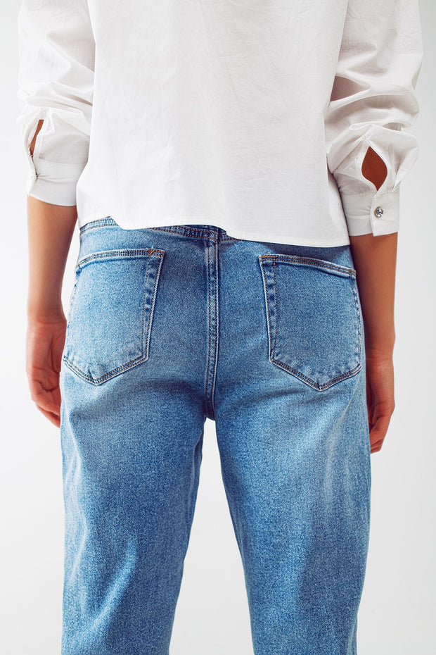 Ripped Knee Straight Leg Jeans in Light Blue Wash