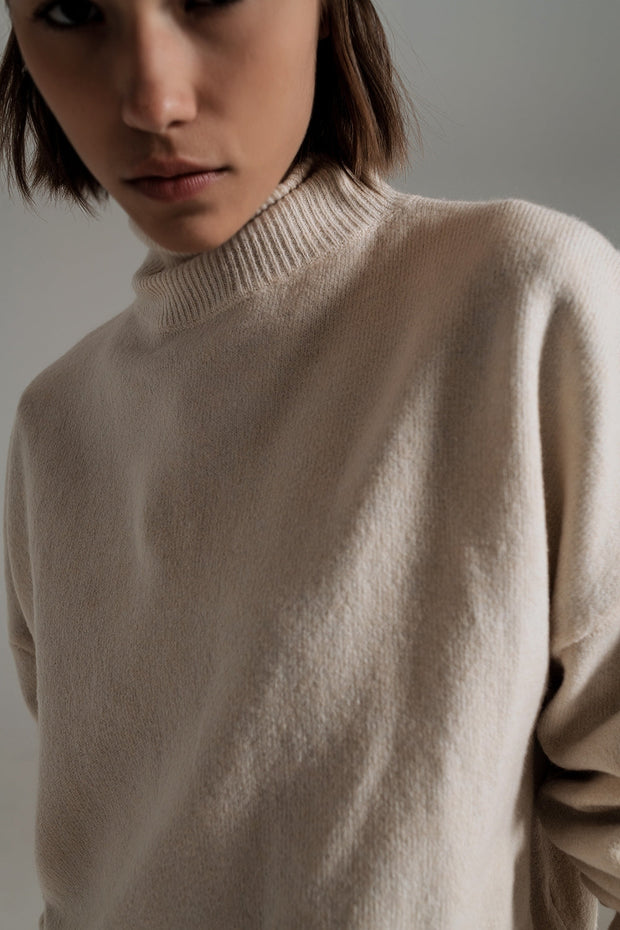 Beige Turtleneck Sweater in a Soft Knitted Fabric