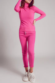 Exposed Buttons Skinny Jeans in Fuchsia