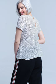 White Polka Dot Top With Ruffle Hem